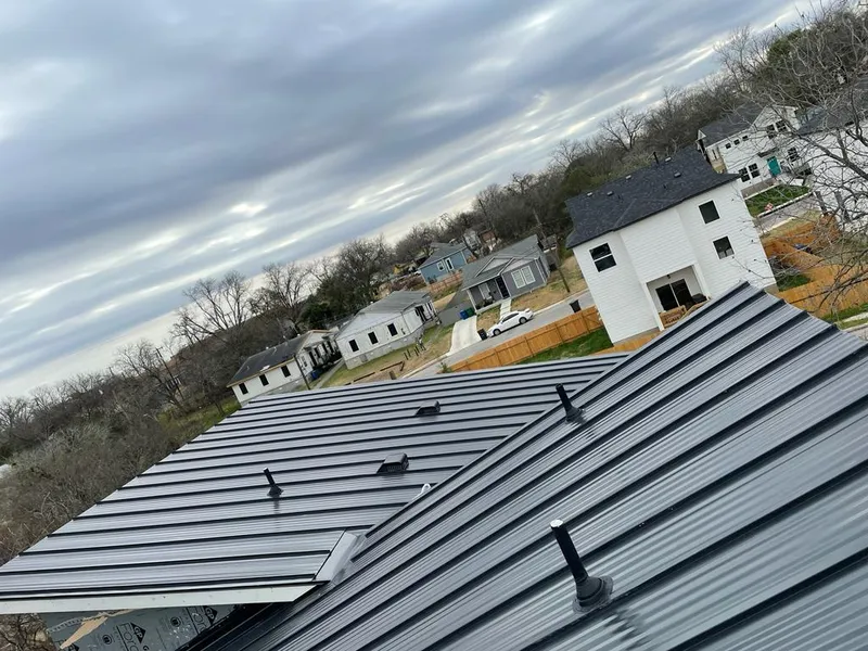Standing seam metal roof panels with vents for Skylight Repair in Cloquet